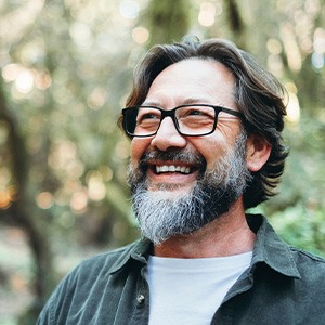 Man smiling outside