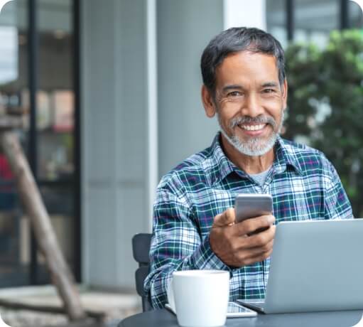 Smiling man enjoying the benefits of dental implants