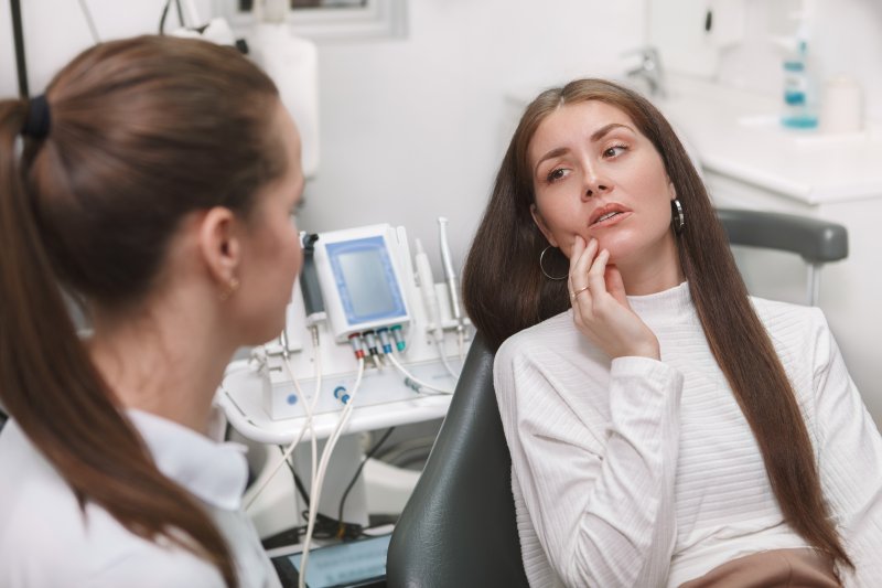 Patient talking to a dentist